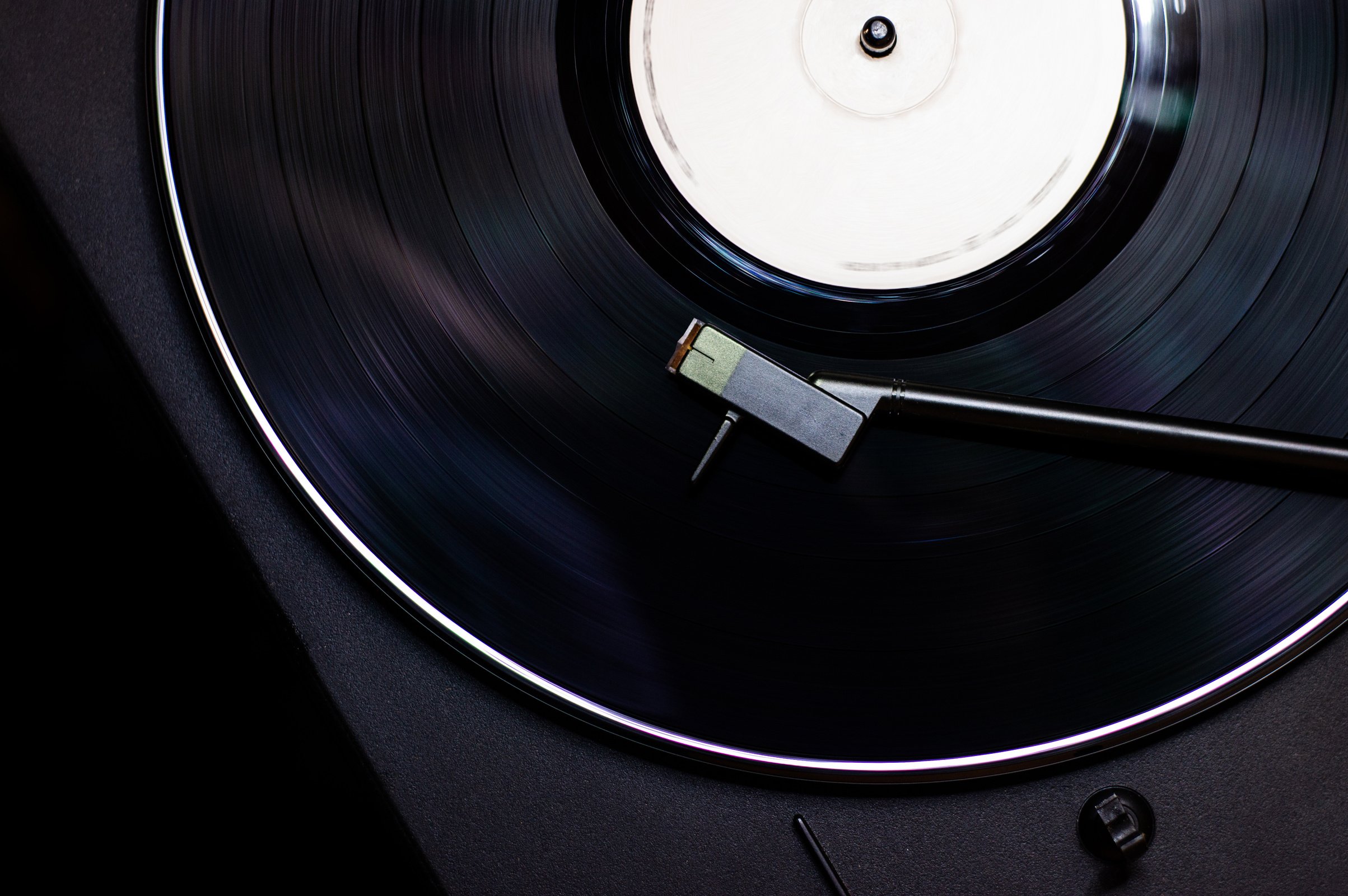 Black Vinyl Record On Black Surface